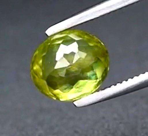1.14ct Yellowish Green Sphene  Oval 6.5x5.7mm Natural Gemstone, Adamantine Luster