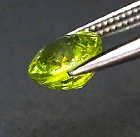 1.14ct Yellowish Green Sphene  Oval 6.5x5.7mm Natural Gemstone, Adamantine Luster