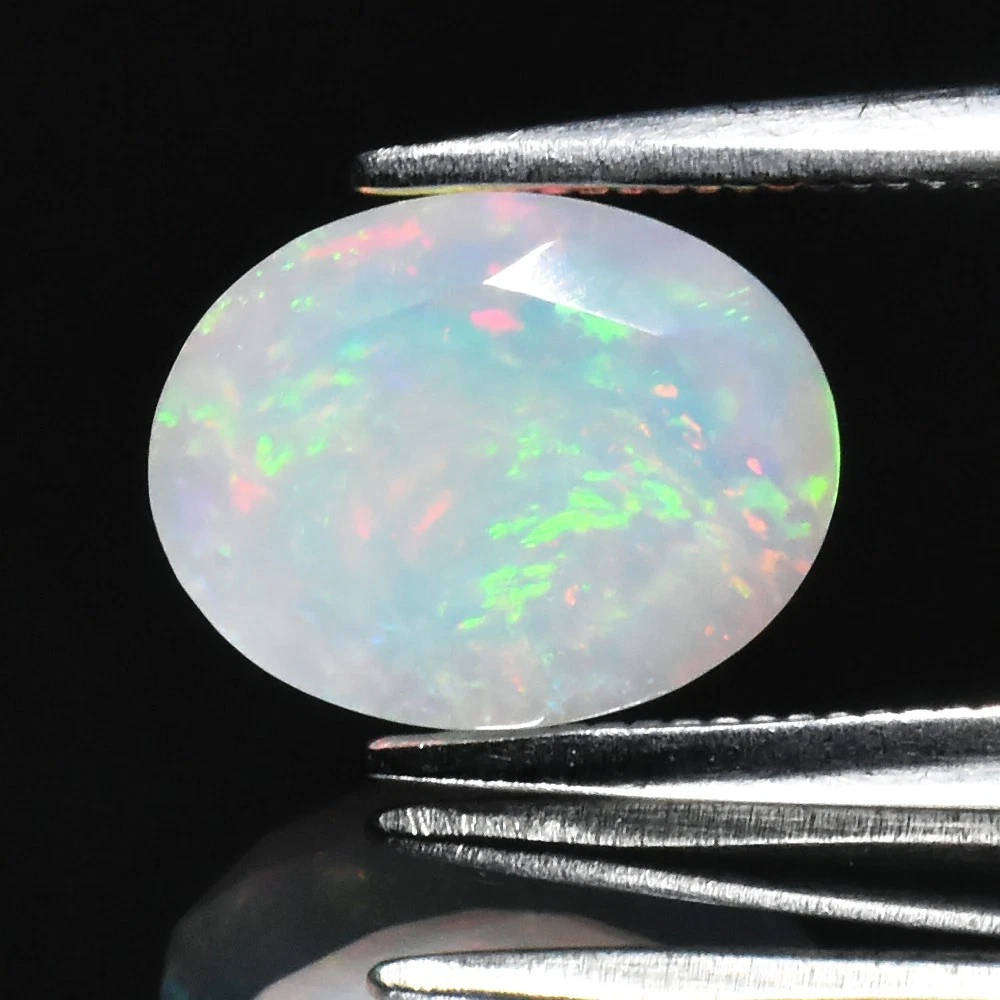 1.32ct Opal VS Oval 9x7mm - Spectral Play, Ethiopia Gemstone Natural