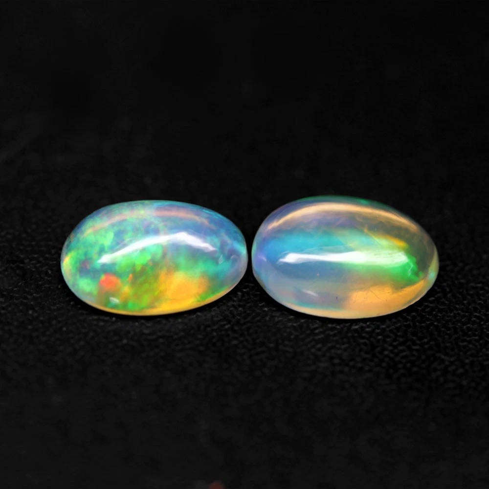 1.02Ct. Opal Oval Cabochon **2 Pieces**Multi Colors Glittering Rainbow 3D! Ethiopian Natural