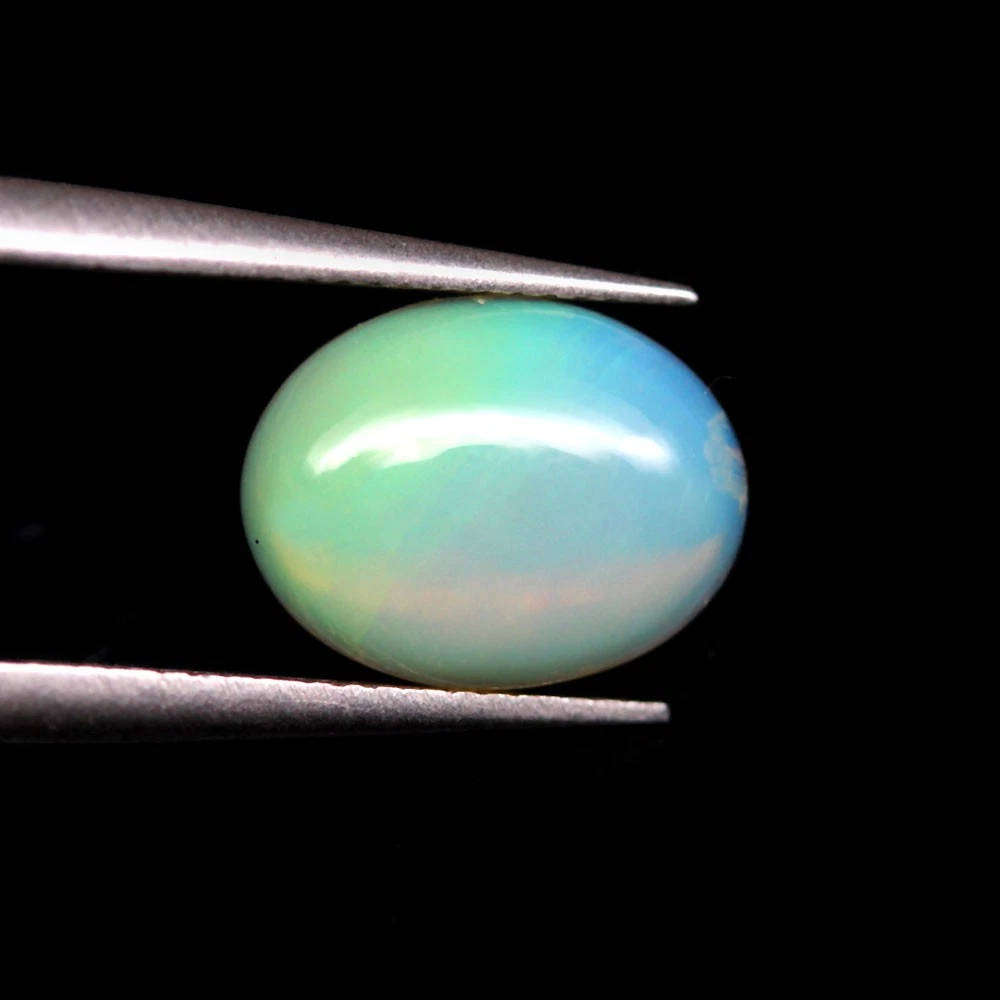 0.95Ct. Gemstone Opal Oval Cabochon Multi Colors Glittering Rainbow 3D Ethiopian