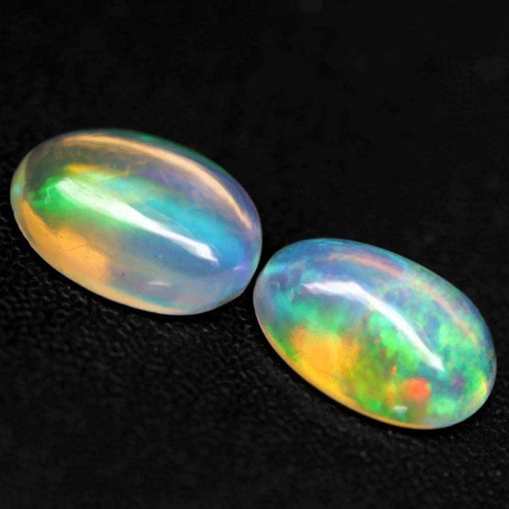 1.02Ct. Opal Oval Cabochon **2 Pieces**Multi Colors Glittering Rainbow 3D! Ethiopian Natural