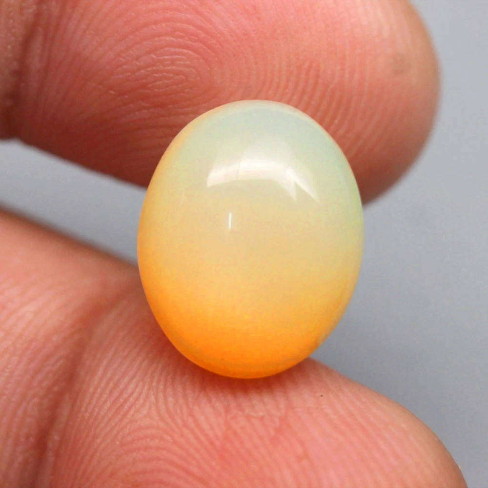 6.94Ct. Opal Oval Cabochon Multi Colors Glittering Rainbow 3D Ethiopian Gemstone