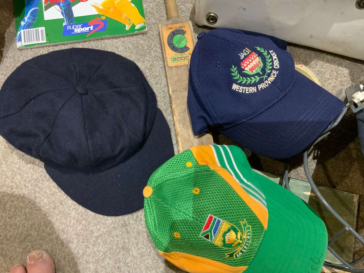 W.P Cricket helmet, players signed book etc