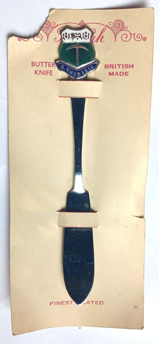 7 x Souvenir Spoons & Butter Knife (International)