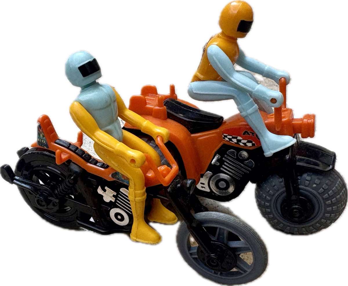Vintage Tomy pop cycle pair with riders 1980