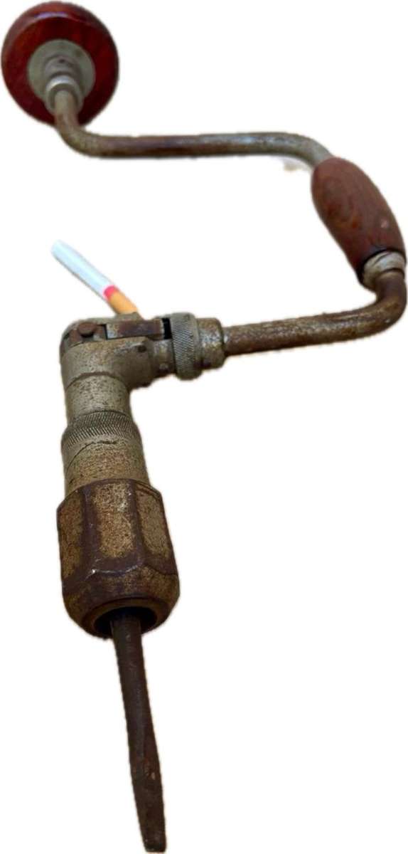 Vintage hand drill with drill bits