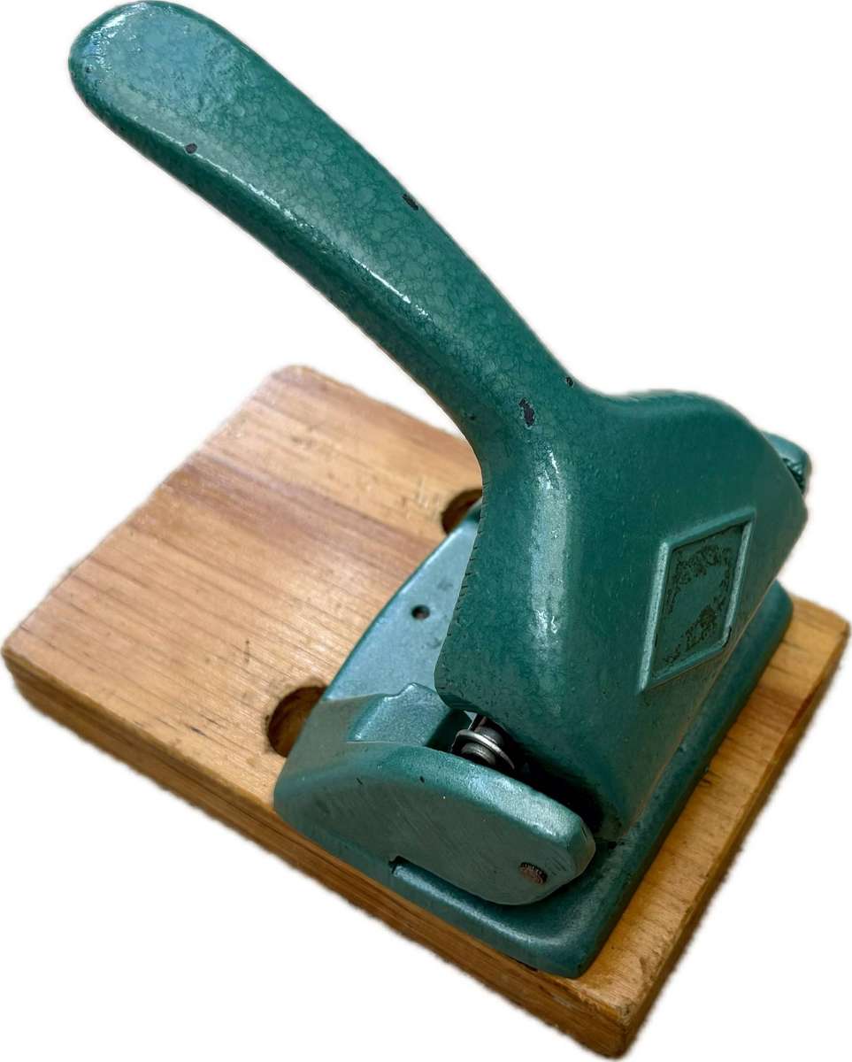 Vintage the Uno senior heavy steel paper punch Paper weight