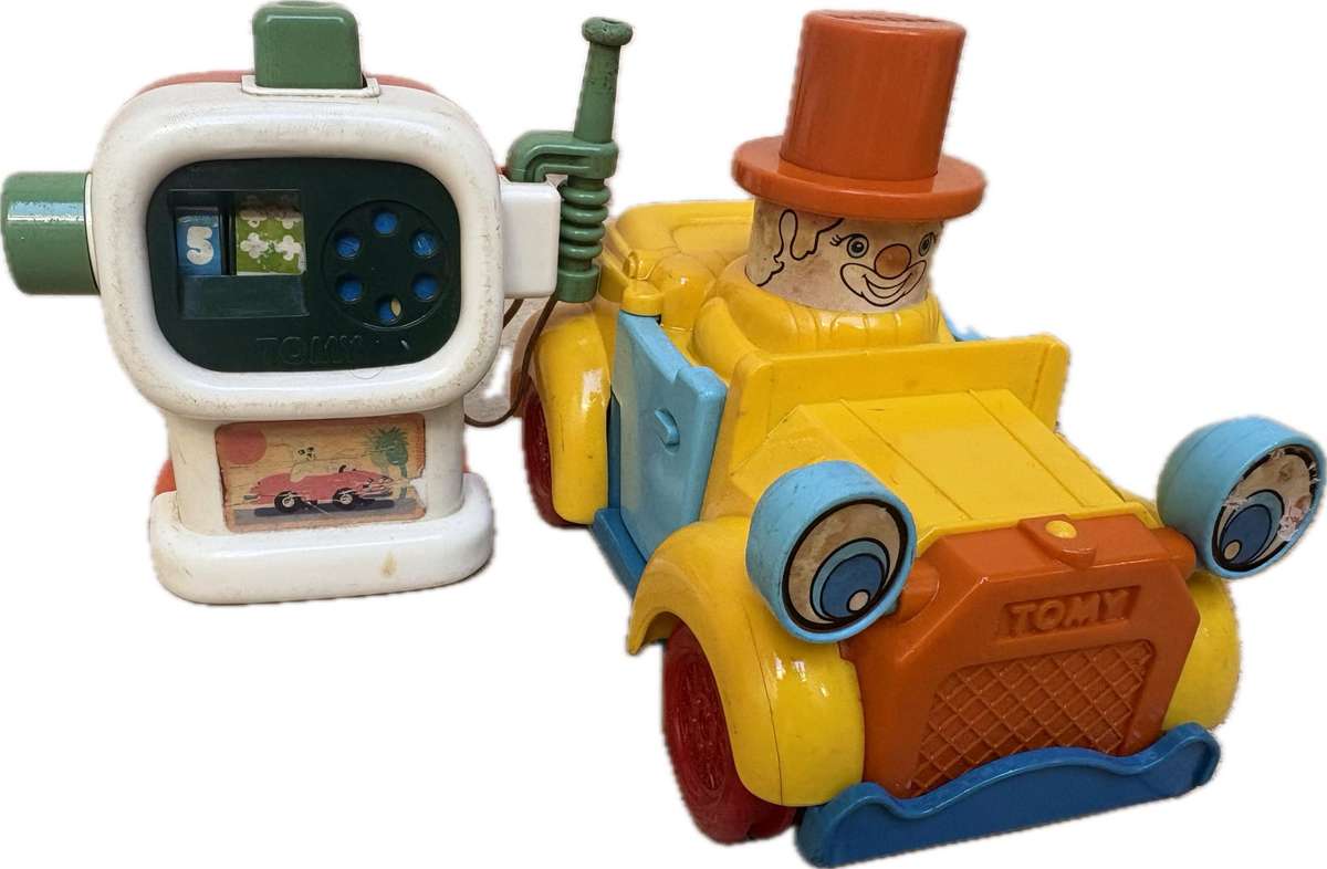 Vintage Tomy push and go car + ring a ding fuel pump 1985