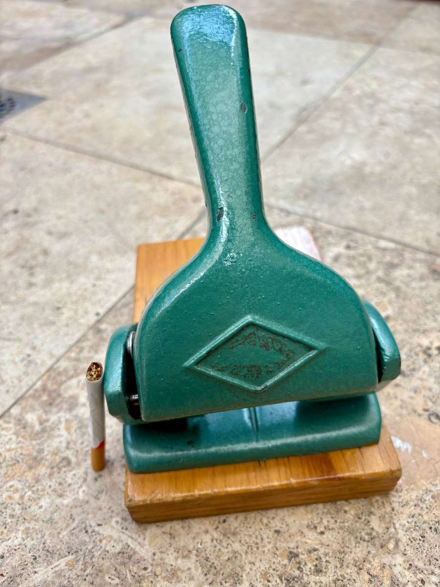 Vintage the Uno senior heavy steel paper punch Paper weight