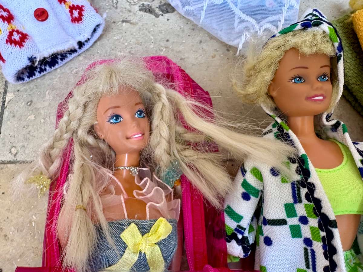 Vintage Barbie doll pair with lots of clothes