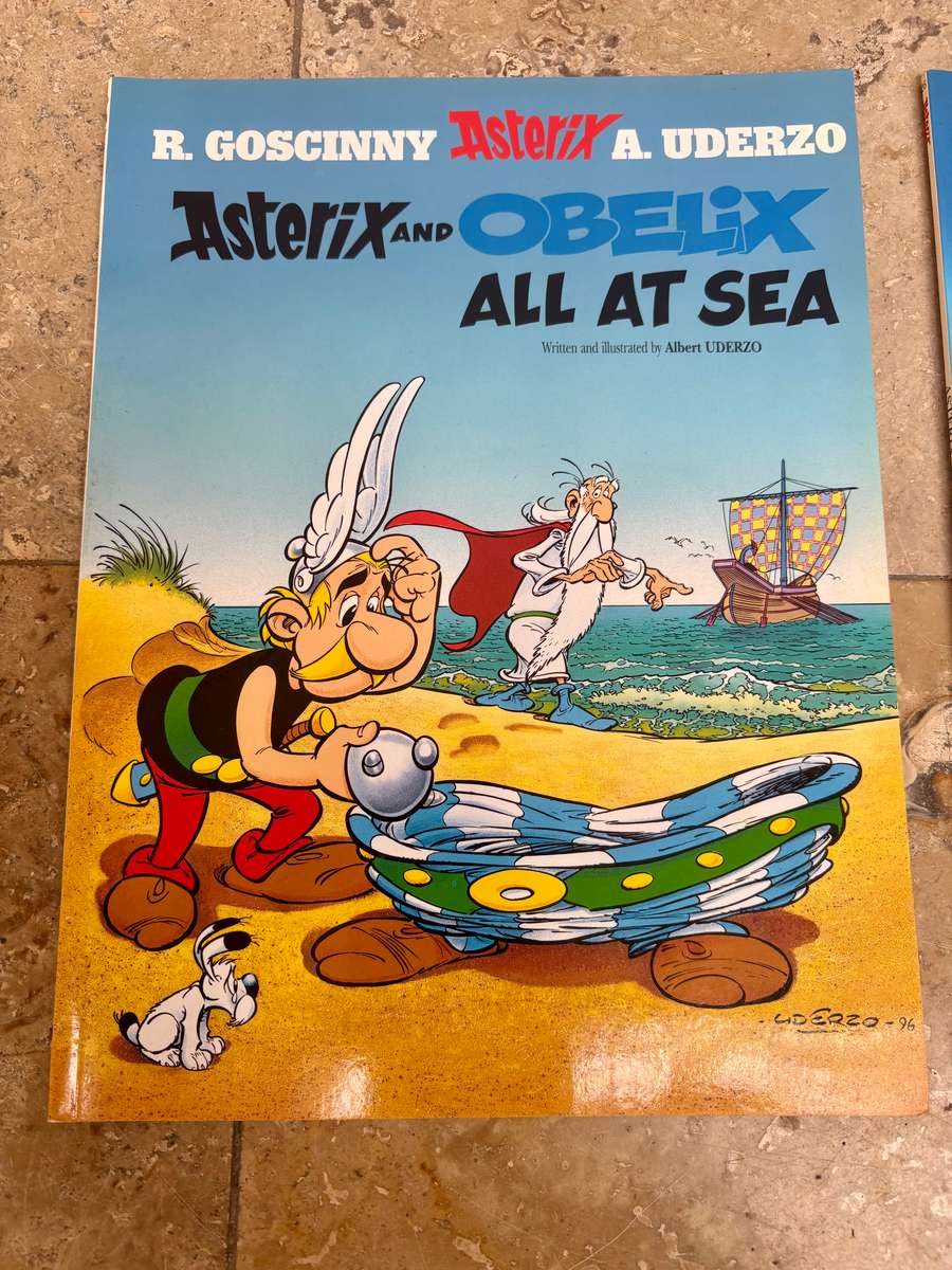 Asterix and Obelix book pair , all at sea and black Gold