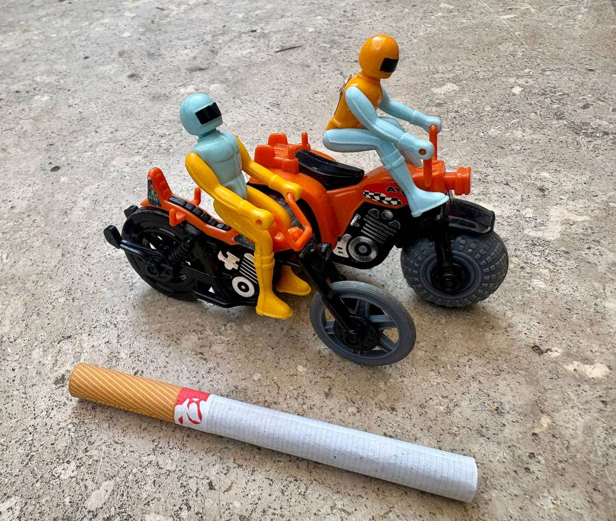 Vintage Tomy pop cycle pair with riders 1980