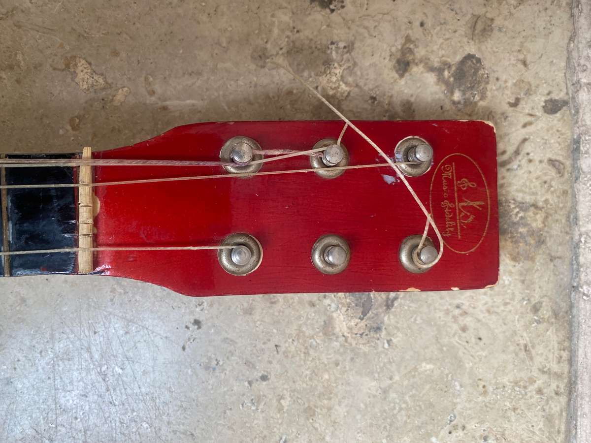 Beginners small 6 string guitar by TS music fidelity with carry bag , needs new string