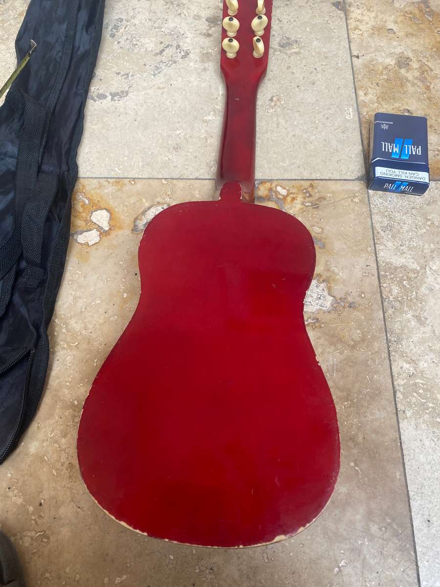 Beginners small 6 string guitar by TS music fidelity with carry bag , needs new string