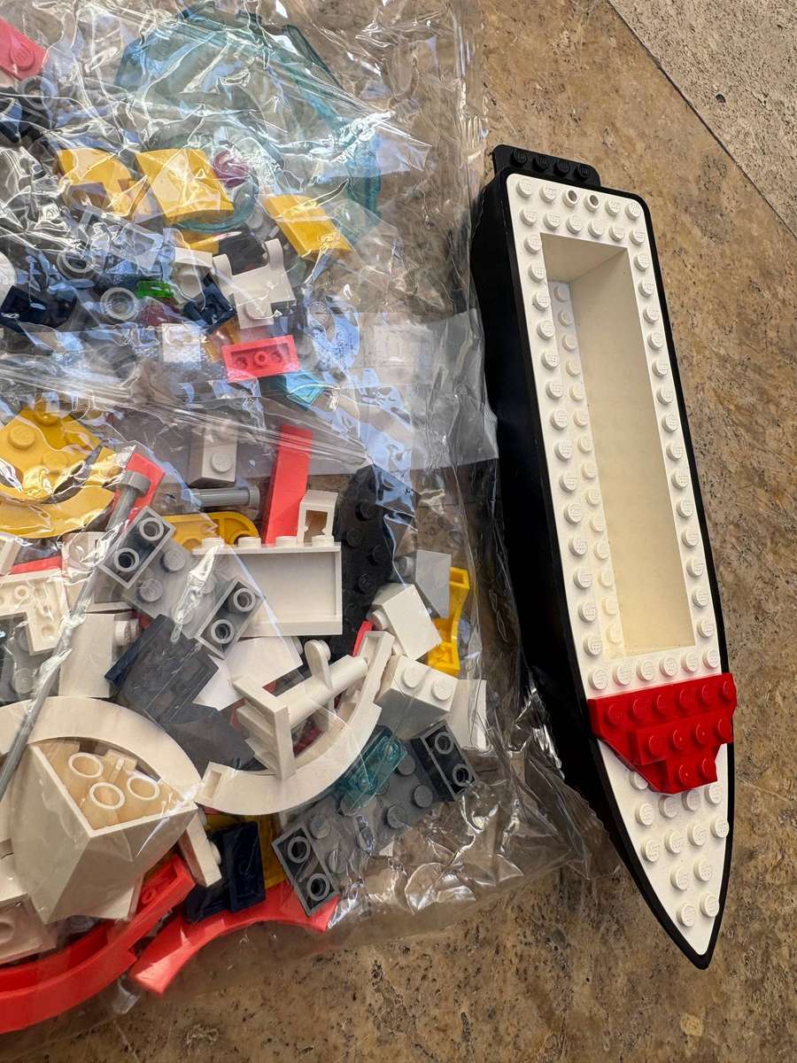 Vintage Lego boat hull riptide racer with boat building spare parts