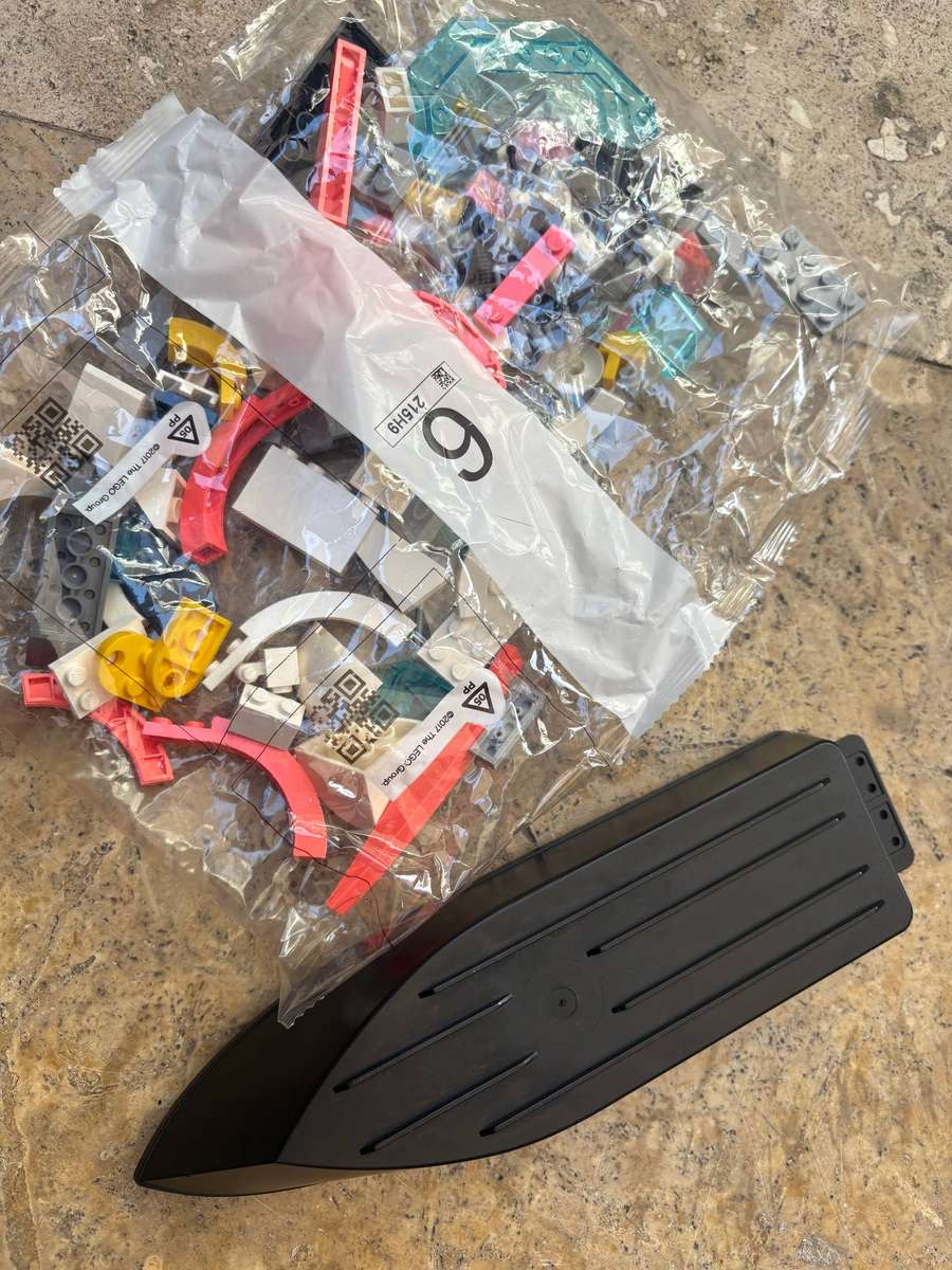 Vintage Lego boat hull riptide racer with boat building spare parts