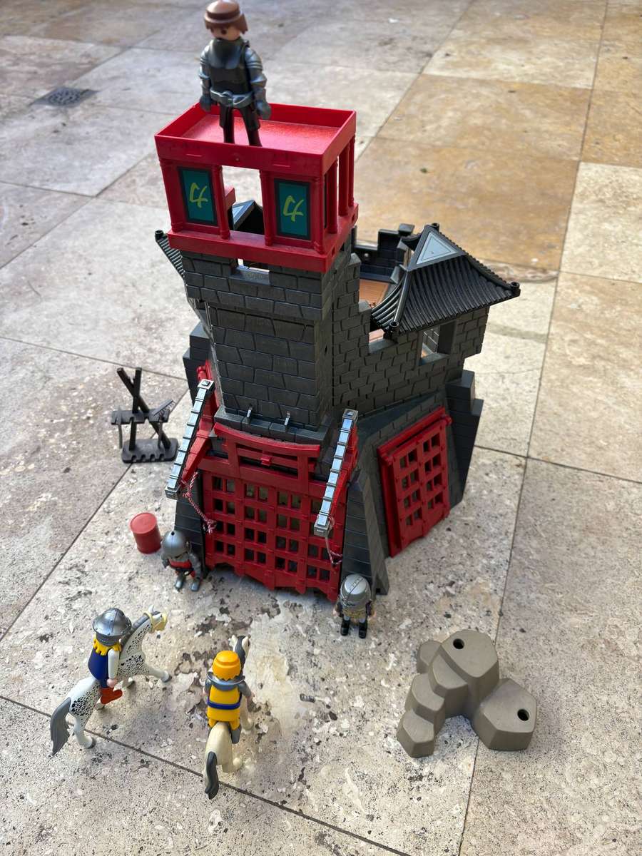 Vintage Playmobil medieval playset with 5 figures and 2 horses
