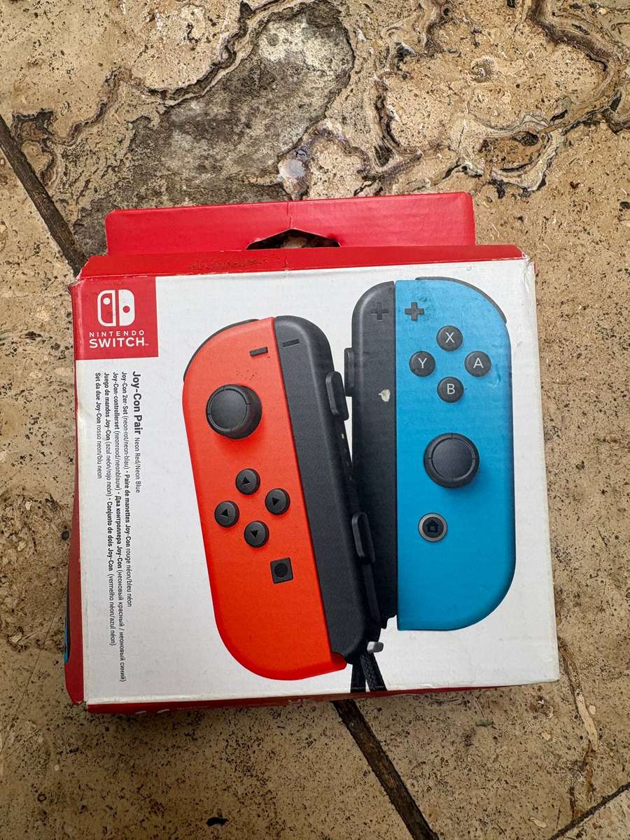 Nintendo Switch  joy con controllers neon red and neon blue