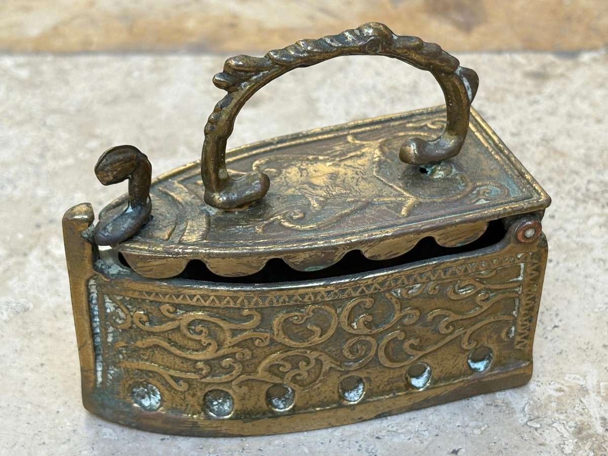 Vintage brass coal iron