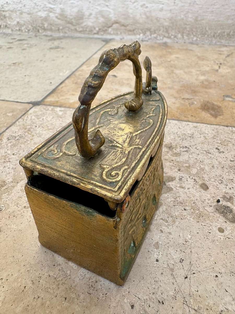 Vintage brass coal iron