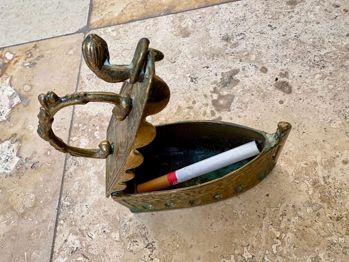 Vintage brass coal iron