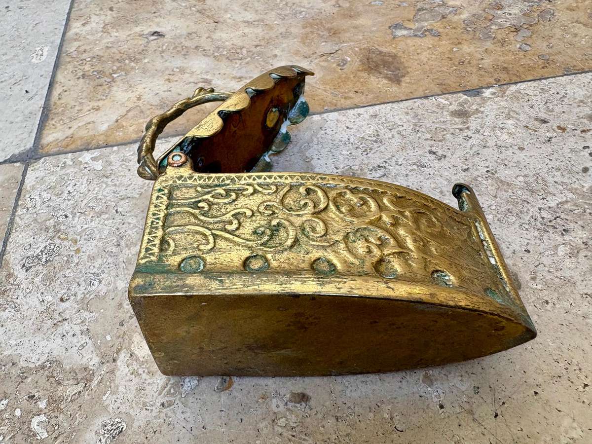 Vintage brass coal iron