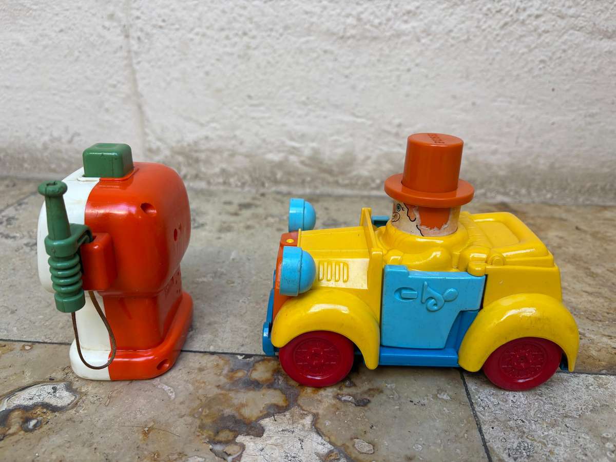 Vintage Tomy push and go car + ring a ding fuel pump 1985