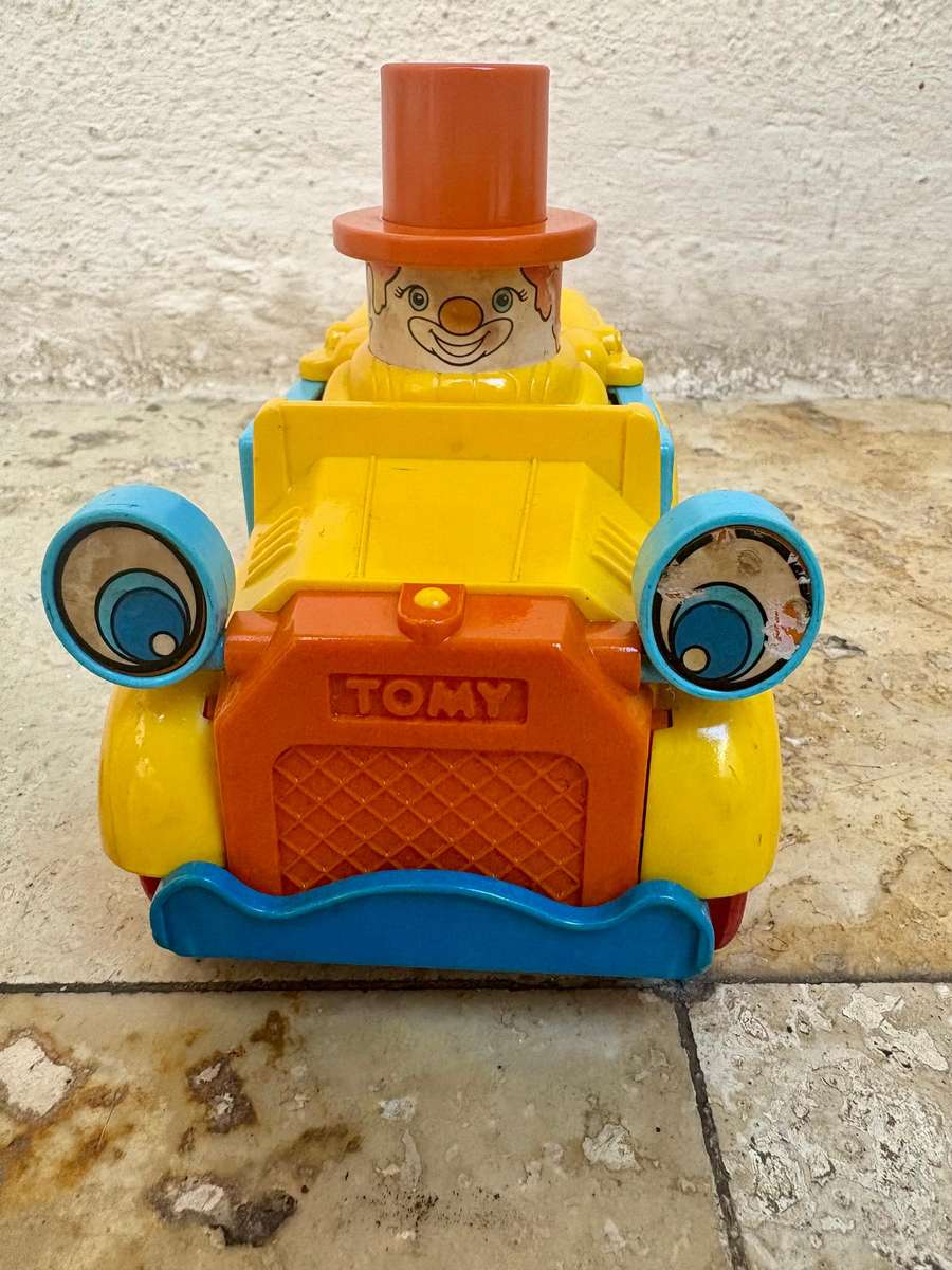 Vintage Tomy push and go car + ring a ding fuel pump 1985