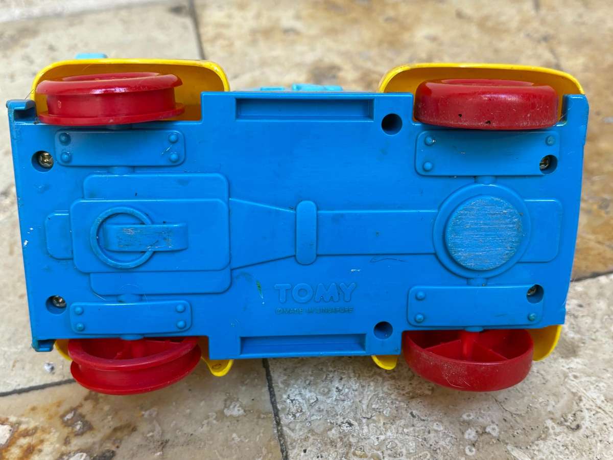 Vintage Tomy push and go car + ring a ding fuel pump 1985