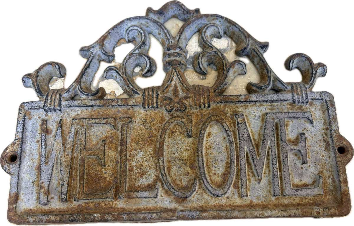 Vintage cast iron welcome sign rustic