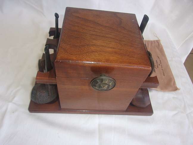 4 Vintage quality smoking pipes and a pipe stand for 1 bid