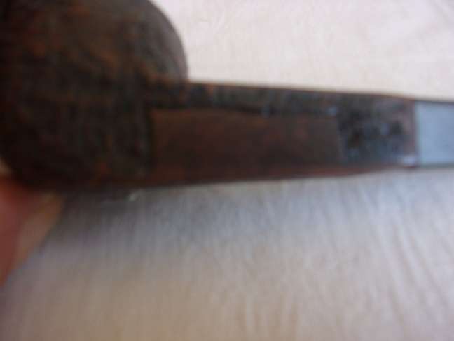 4 Vintage quality smoking pipes and a pipe stand for 1 bid