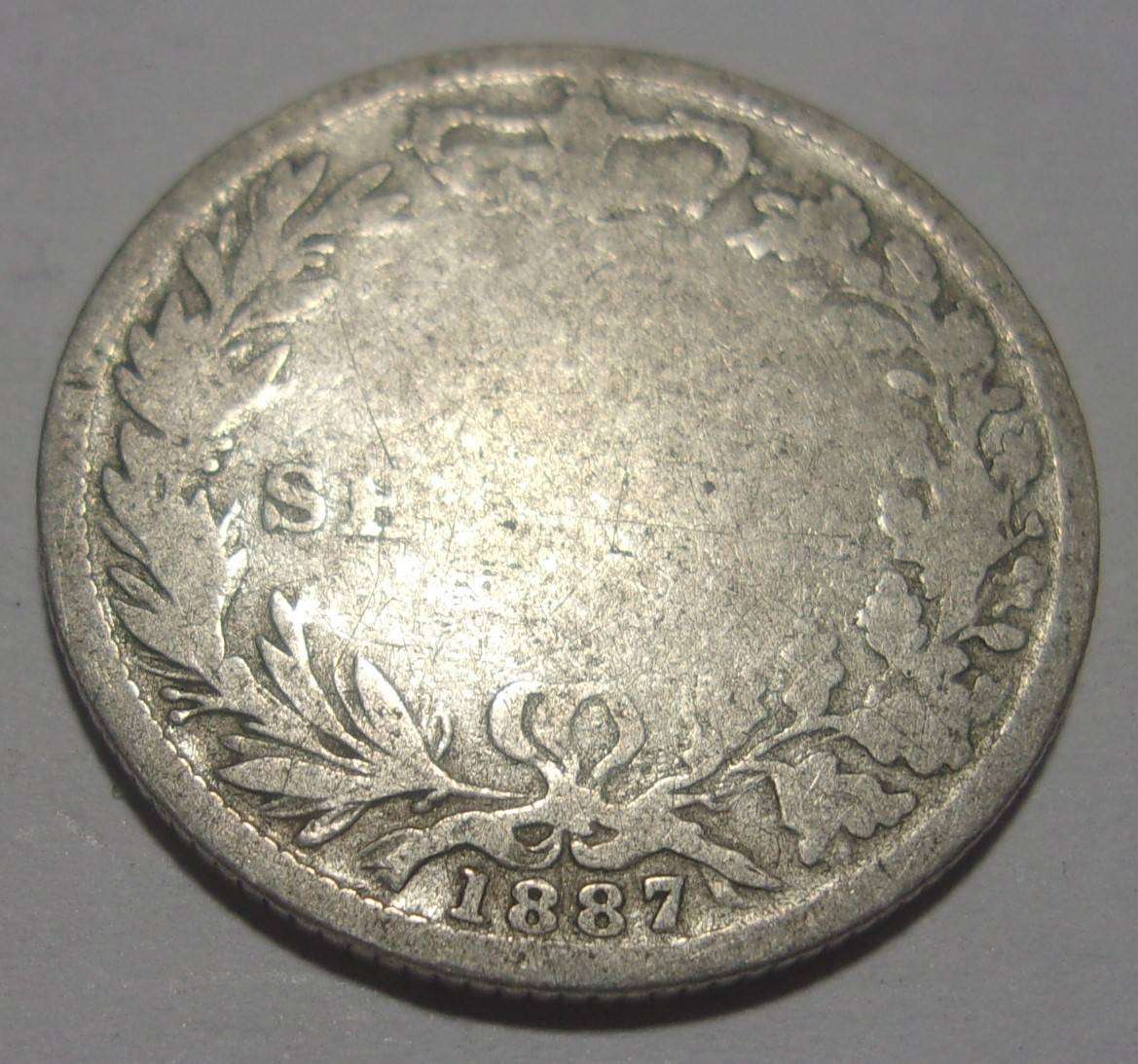 1887 silver British One Shilling coin