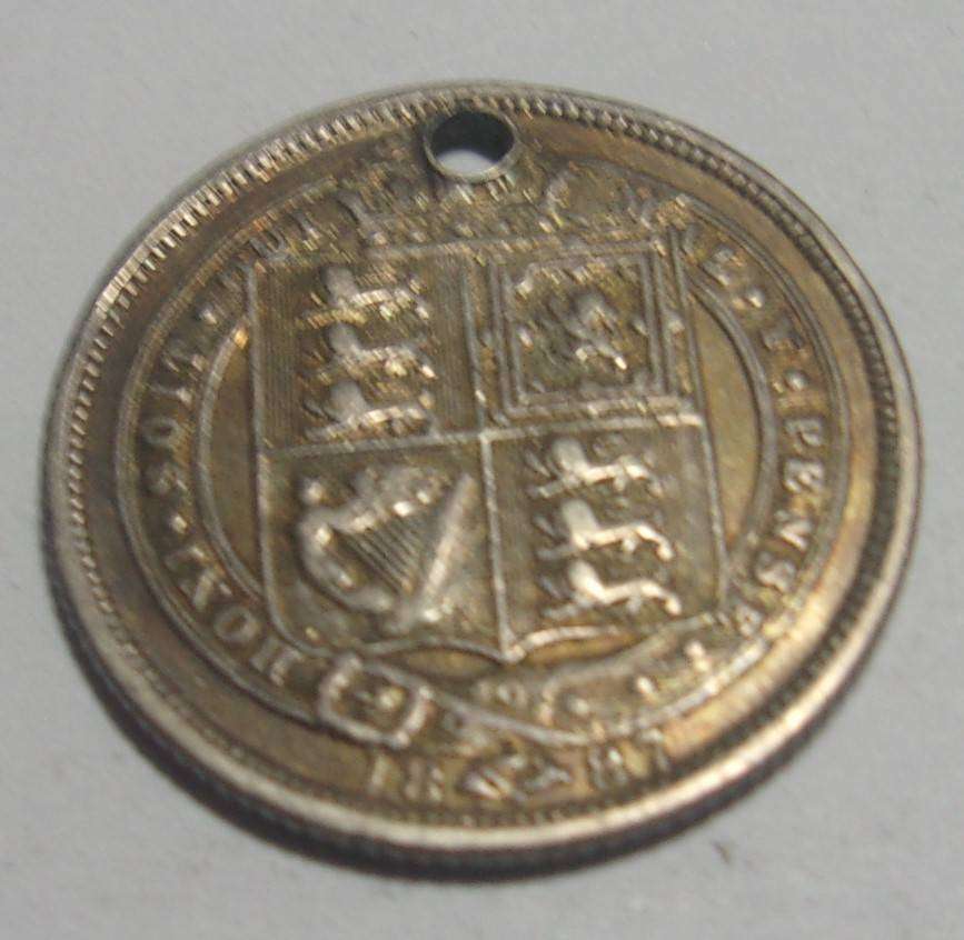 1887 silver British 6 Pence coin, holed - last coin lots
