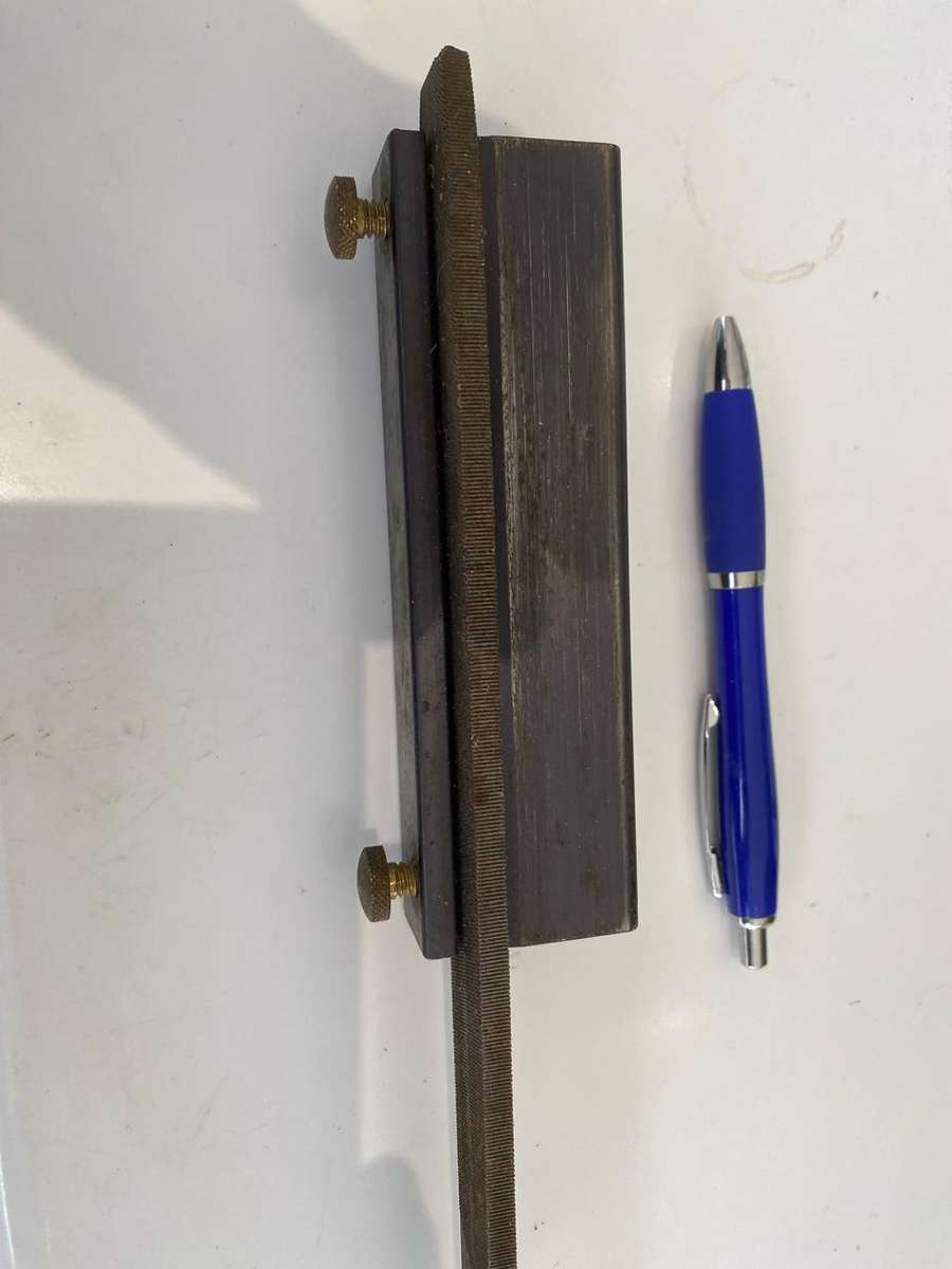Veritas Jig is for preparing your scraper at 90 degrees before sharpening it with a burnisher
