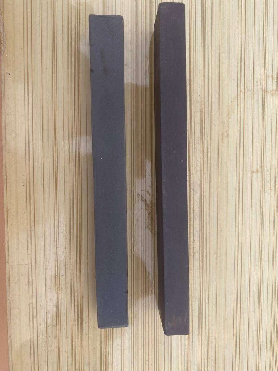 Two Very Fine Black Hard Oilstones.  -  15x2.5x1 cm and 15x1.5x1.5cm.  - New.