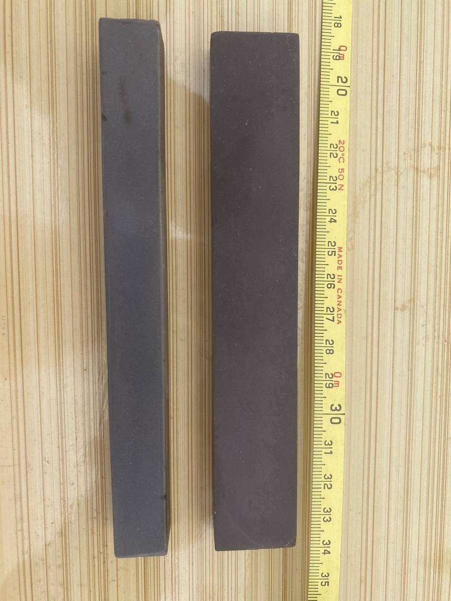 Two Very Fine Black Hard Oilstones.  -  15x2.5x1 cm and 15x1.5x1.5cm.  - New.