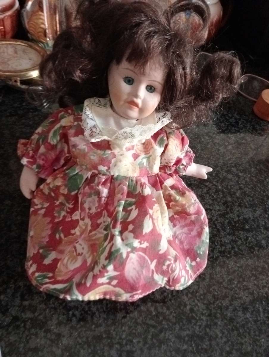 VINTAGE PORCELAIN DOLL