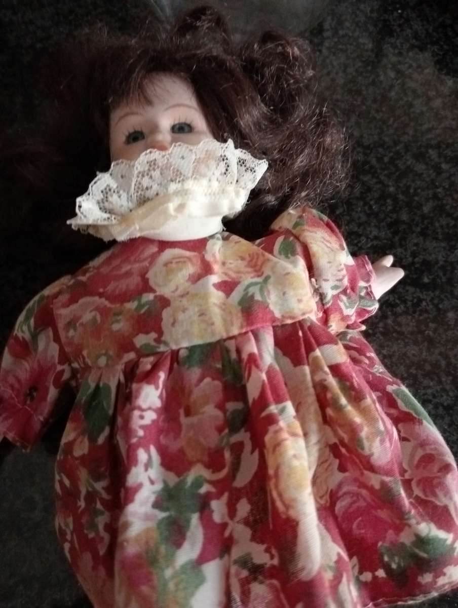VINTAGE PORCELAIN DOLL