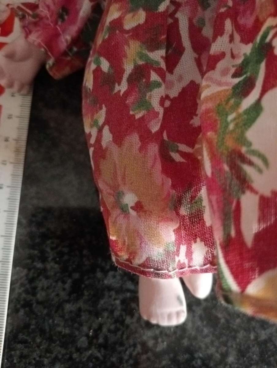 VINTAGE PORCELAIN DOLL