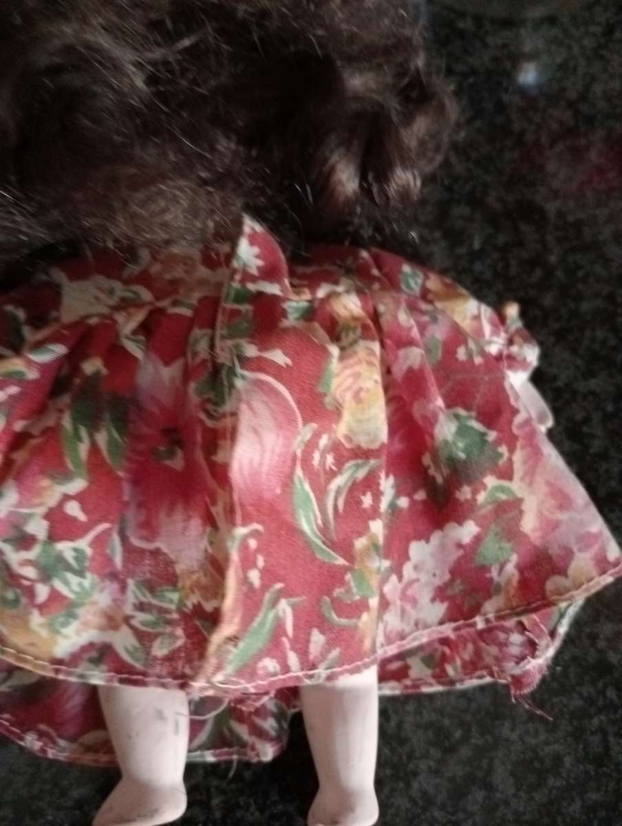 VINTAGE PORCELAIN DOLL