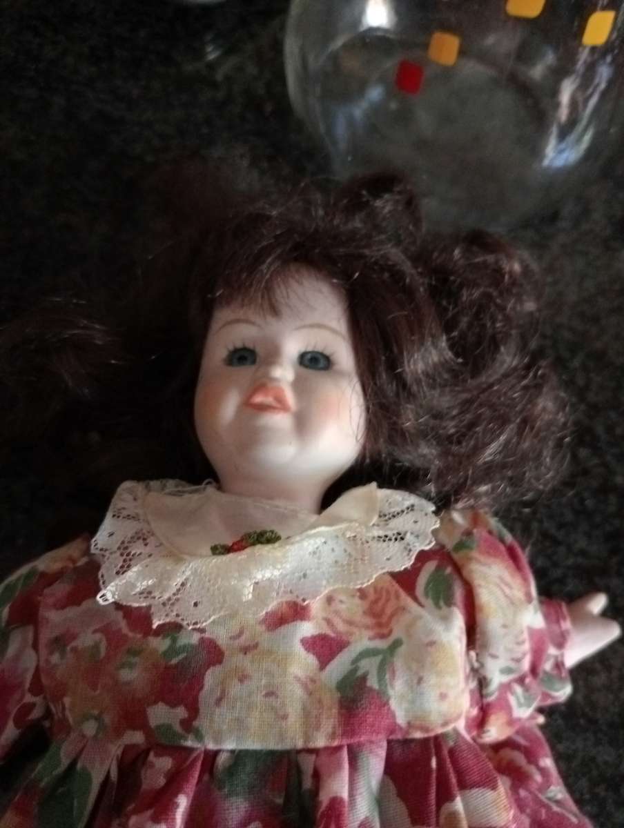 VINTAGE PORCELAIN DOLL