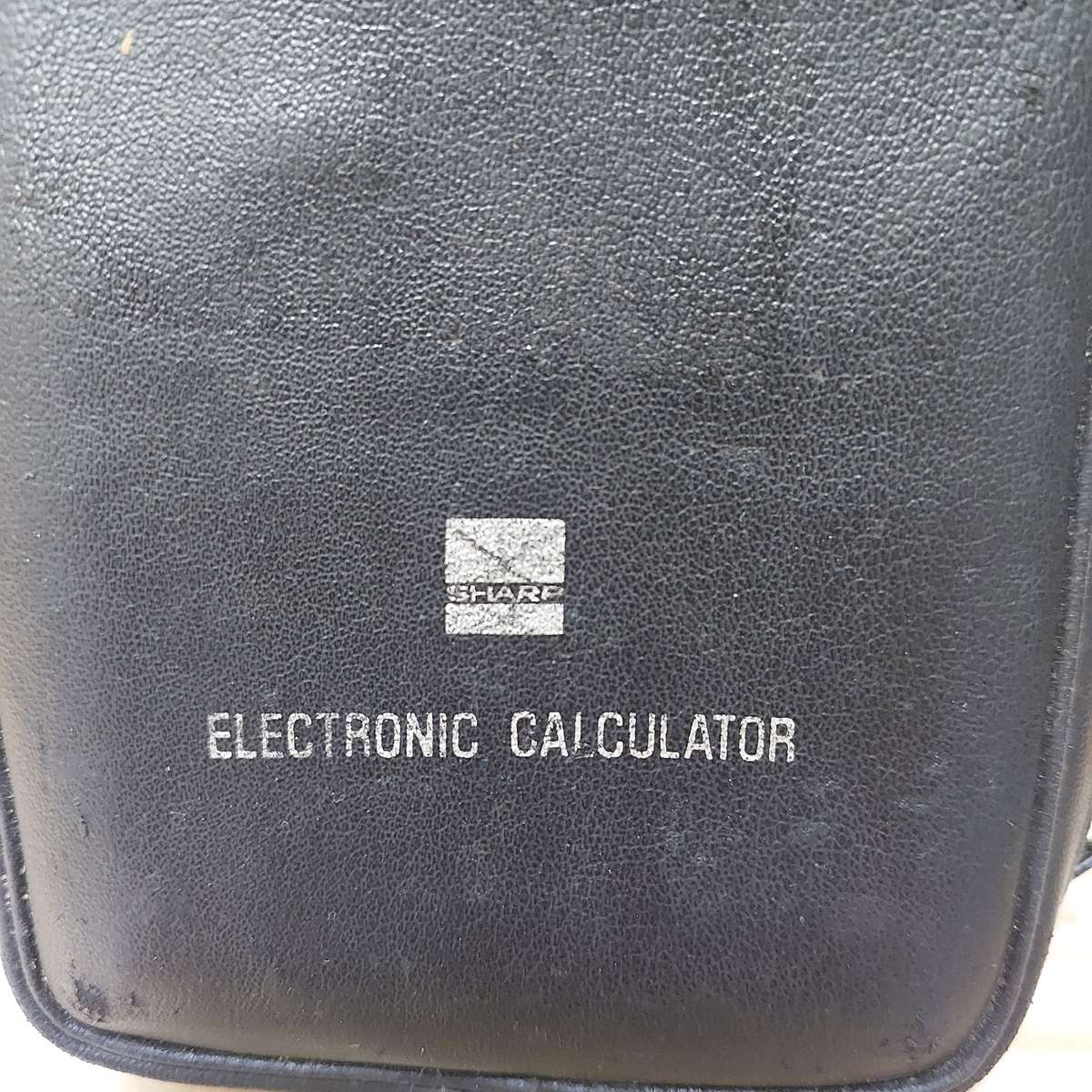 Vintage Sharp PC 1802 pocket calculator