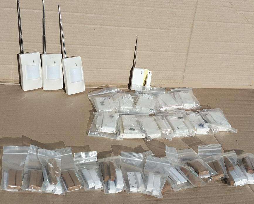 Home GSM alarm system with wireless sensors and wired switches