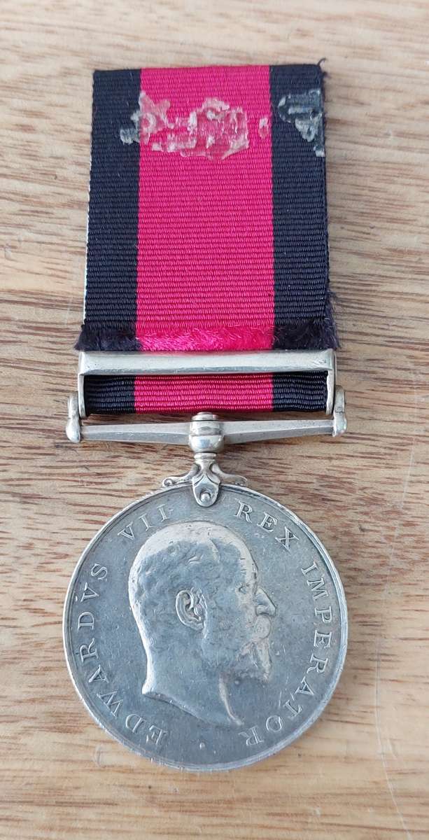 # Full Size 1907 Natal Rebellion Medal with 1906 Clasp to (DVR. J. Moore. B.Battery. N.F.A. ) #