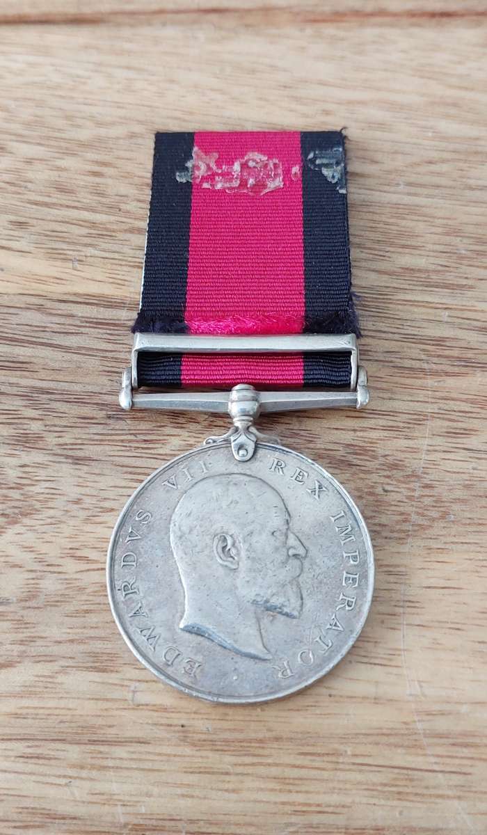 # Full Size 1907 Natal Rebellion Medal with 1906 Clasp to (DVR. J. Moore. B.Battery. N.F.A. ) #