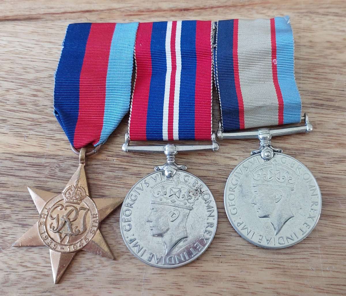 # Very Nice Australian Imperial Forces Group of 3 x WWII Medals to G.E. Lorimer #