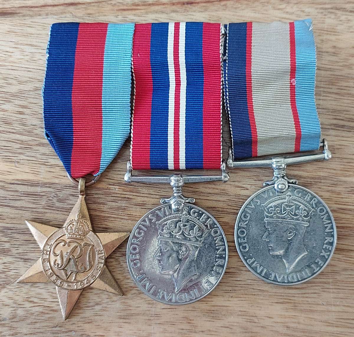 # Very Nice Australian Imperial Forces Group of 3 x WWII Medals to G.E. Lorimer #