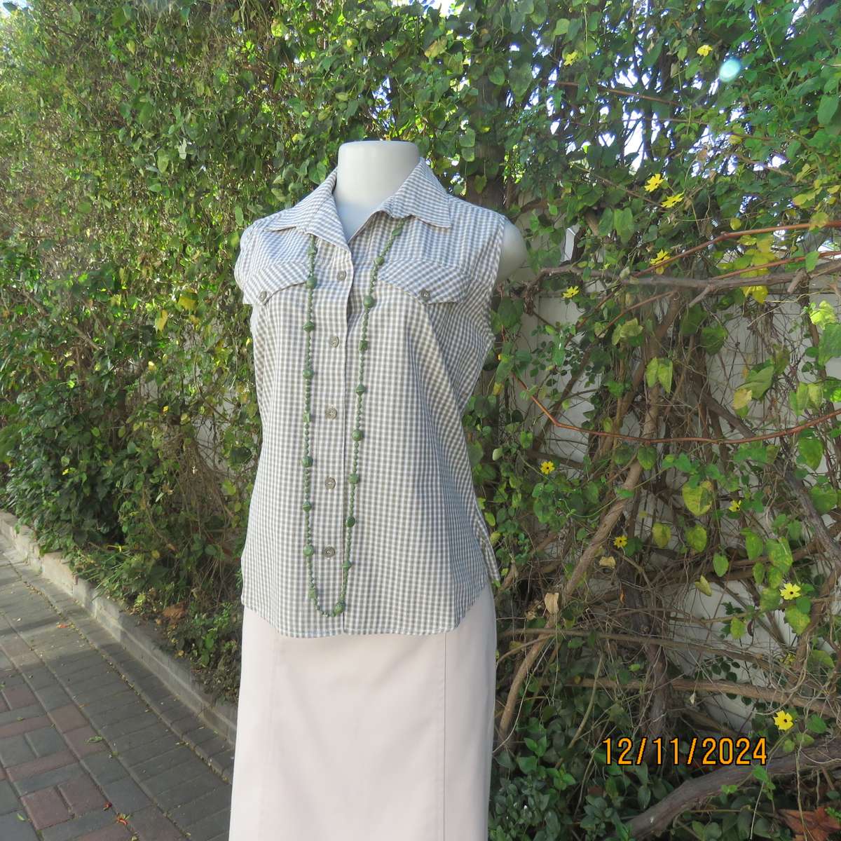 Olive green and cream check cotton button down top. Yoked front. Size 36.